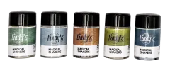 Fünf Gläschen des Lindys Stamp Gang Magical Shakers Sets Amber Ledgers nebeneinander