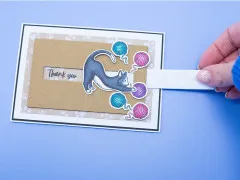 Schiebekarte mit kolorierter Katze und Wollknäueln, Zuglasche und Thank-you-Schriftzug