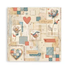 Patchwork-Designpapier mit bunten quadratischen Motiven in Blau, Korall, Creme und Weiß-Mustern