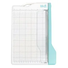 Mini Guillotine Paper Cutter mit geöffnetem Schneidekopf, detaillierte Draufsicht der Klinge und Rasterfläche