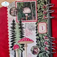 Detailansicht eines herbstlichen Scrapbook Projekts mit Pilzmotiven und Bäumen