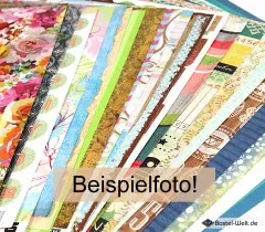 Detailansicht Scrapbook-Papierbögen mit bunten Mustern, Blüten, Streifen und Ornamentdesigns im Fächer