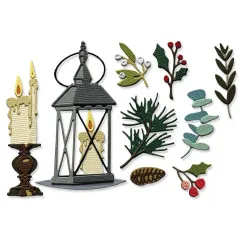 Fertig ausgestanzte und kolorierte Motive des Sizzix Sets wie Laterne, Kerzen und Winterlaub im Detail.