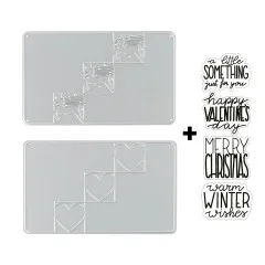 Metall-Stanzschablonen und transparente Silikonstempel mit Motiven für Winter und Valentinstag im Detail.