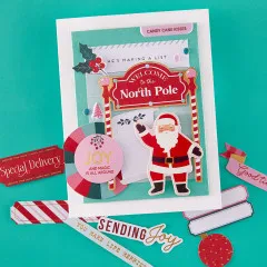 Scrapbook-Layout mit Foto, Alphabet-Buchstaben „BELIEVE“ und Weihnachtsmann-Sticker