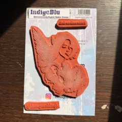 Ungemountetes Gummistempel-Set mit Fee und zwei Textstempeln auf Werbekarte.
