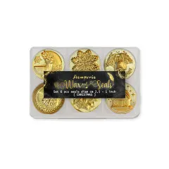 Set mit 6 goldfarbenen Wachssiegeln mit Weihnachtsmotiven: Rentier, Schneeflocke, Glocke, Kranz, Stern und Haus.