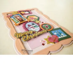 Handgemachte Weihnachtskarte mit Bilderrahmen und Herzen in Schrägansicht
