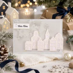 Weiße Winterkarte Winter Wishes mit gestanzter Häuserreihe aus Glitzerkarton