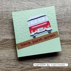 Mintgrüne Karte mit gestempeltem roten Bus von hinten im Schnee und Schriftzug Winter Season's Greetings