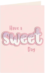 Fertige Karte mit dem Schriftzug 'Have a Sweet Day' in Rosa, Weiß und Glitzer-Flieder auf zartrosa Karte