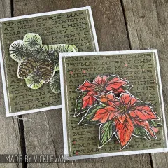 Zwei Karten mit Tannenzapfen und rotem Weihnachtsstern vor Merry-Christmas-Schrift